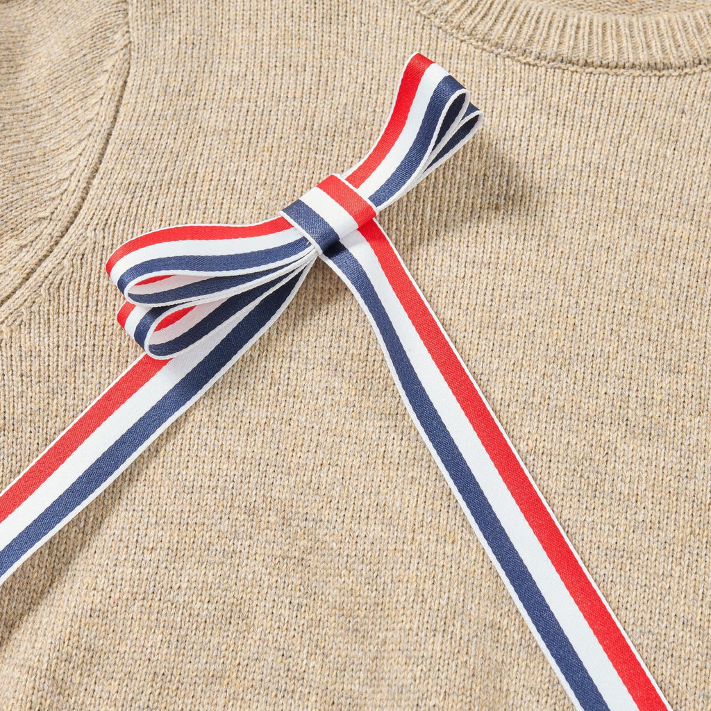 Bow-knitted sweater + short skirt