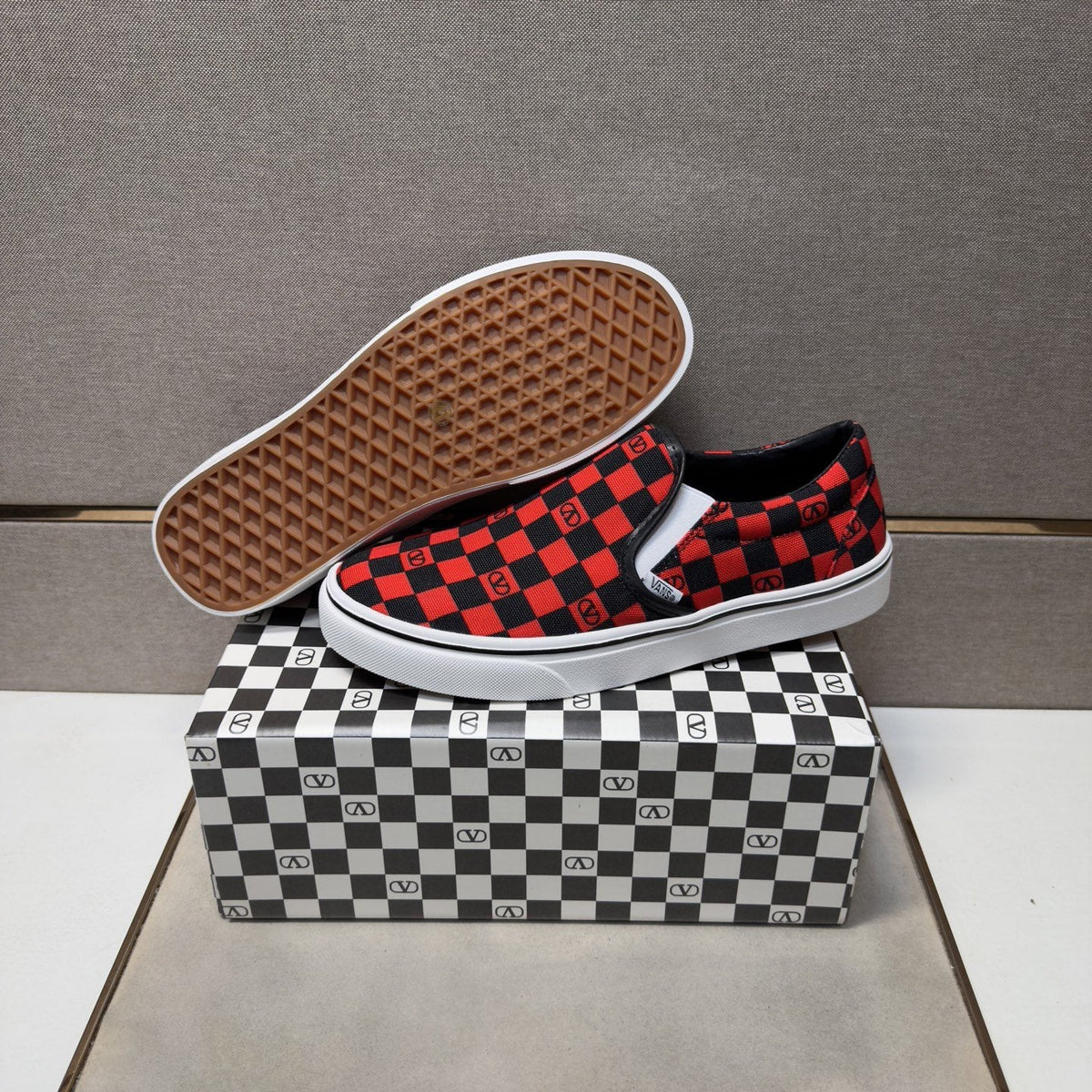 Vans Red and Black Checkerboard Slip-On Sneakers